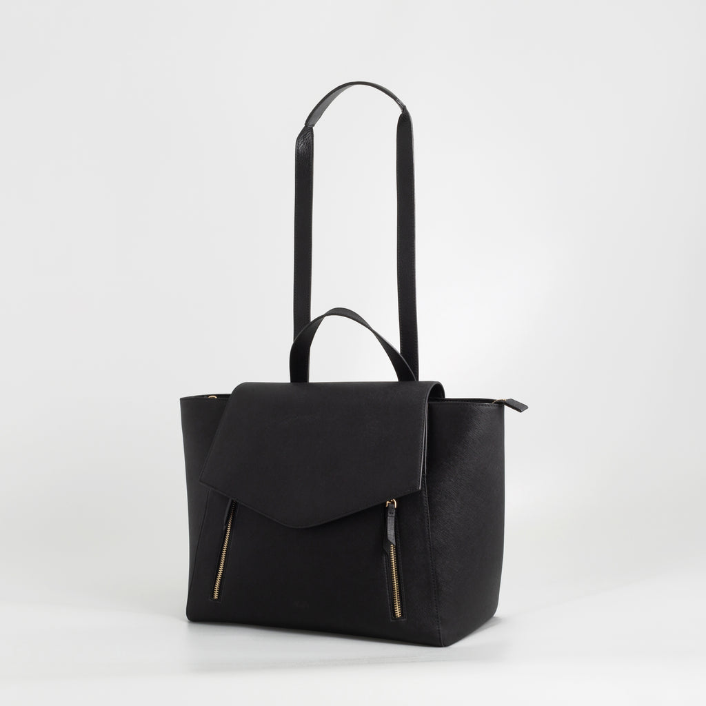 AGIKI Classic black genuine leather convertible laptop work bag for women with adjustable strap.