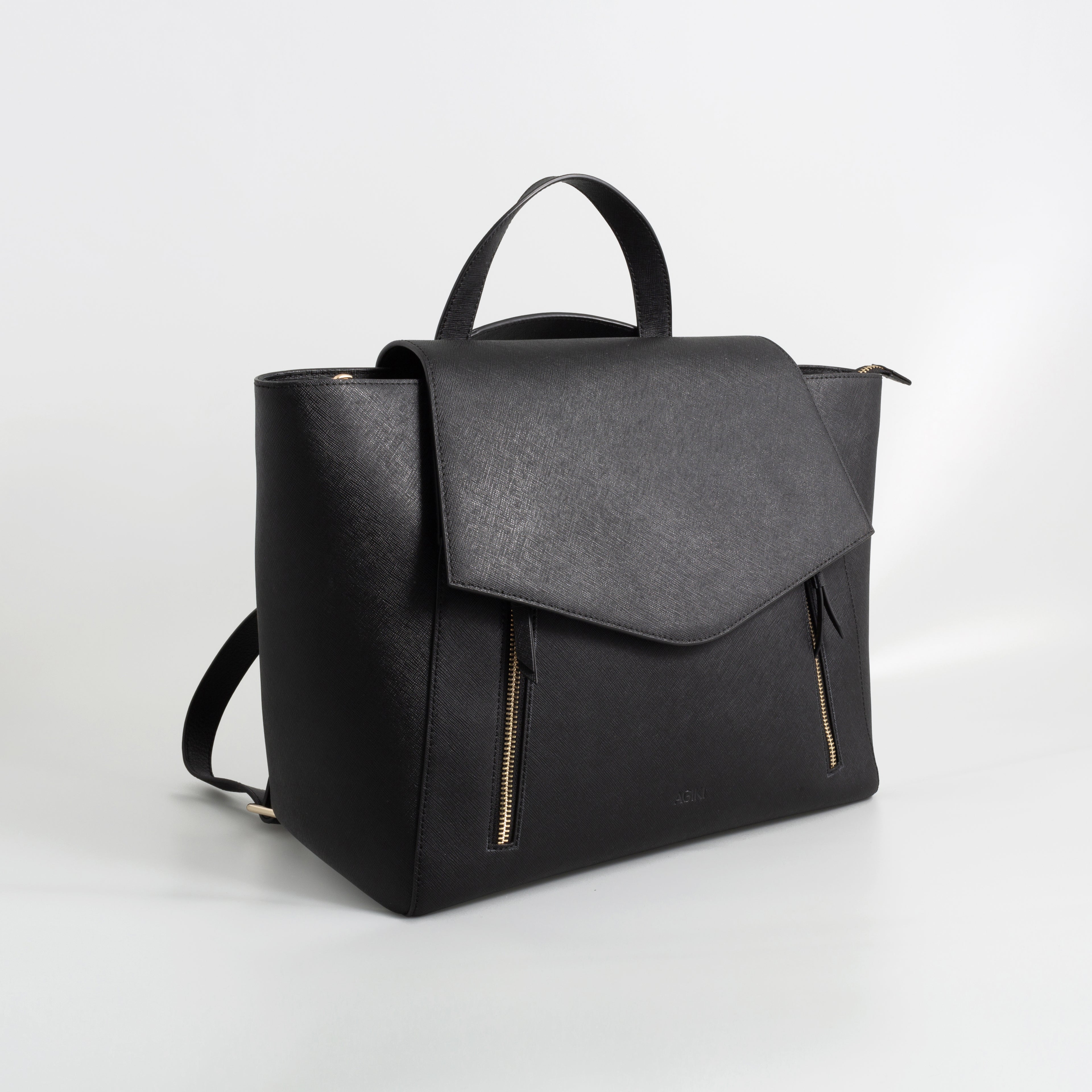 AGIKI Classic Black convertible genuine leather laptop work bag for women with adjustable strap, shown in backpack mode