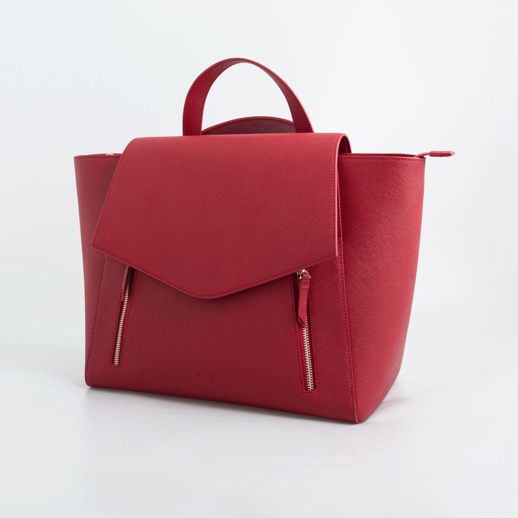 AGIKI Classic red convertible genuine leather laptop work bag for women with adjustable strap, shown in backpack mode